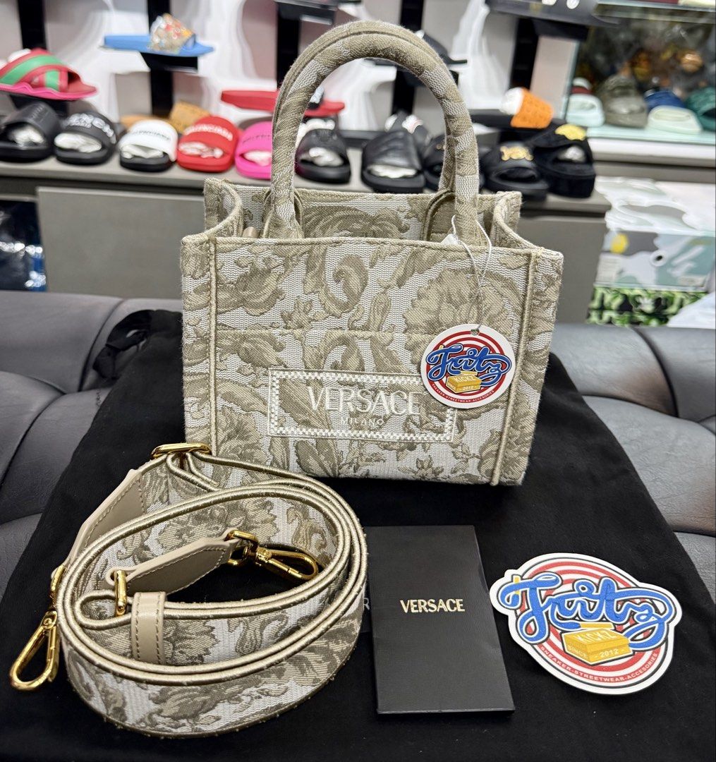versace small barocco athena tote bag (Category: Luxury Bags & Wallets) located in Pasay City. Submitted by fritz_kickz_2012 (Listing ID 1451730368, Image 1). Description: V€R$@C€ small Barocco Athena Tote Bag ( fits to iphone 17promax ) Colorway: beige Complete Inclusion with Dust Bag / Care Card / Paper Bg Brandnew / Onhand srp 85,000 sell for 55,000 only PM for Inquiries Thankyou ➡️➡️➡️ Fritz Kickz 👟.