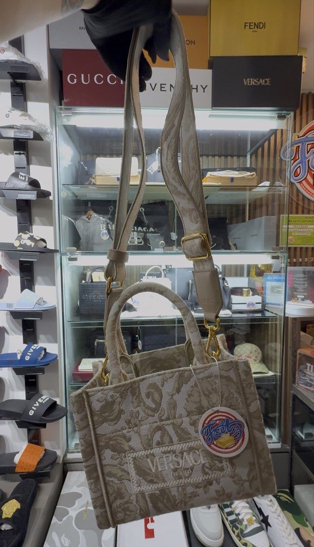 versace small barocco athena tote bag (Category: Luxury Bags & Wallets) located in Pasay City. Submitted by fritz_kickz_2012 (Listing ID 1451730368, Image 3). Description: V€R$@C€ small Barocco Athena Tote Bag ( fits to iphone 17promax ) Colorway: beige Complete Inclusion with Dust Bag / Care Card / Paper Bg Brandnew / Onhand srp 85,000 sell for 55,000 only PM for Inquiries Thankyou ➡️➡️➡️ Fritz Kickz 👟.