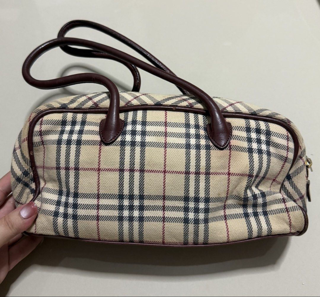 Vintage Burberry Blue Label handbag (Category: Luxury Bags & Wallets) located in Pasig City. Submitted by dancieaa03 (Listing ID 1451868304, Image 3). Description: - Classic Burberry Haymarket check handbag - Beige canvas with signature check pattern - Leather trim and handles - Handles show some wear - Secure zipper closure .