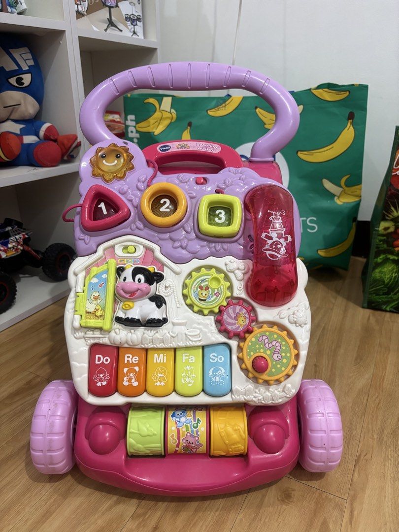 Vtech learning walker (Category: Infant Playtime) located in Valenzuela. Submitted by cmdgbaby (Listing ID 1451894593, Image 2). Description: VTech Learning Walker 🌈🧸 ✔️ Original VTech ✔️ Good condition ✔️ Lights, sounds & interactive learning activities ✔️ Helps encourage baby’s first steps ✔️ Clean and ready to use.