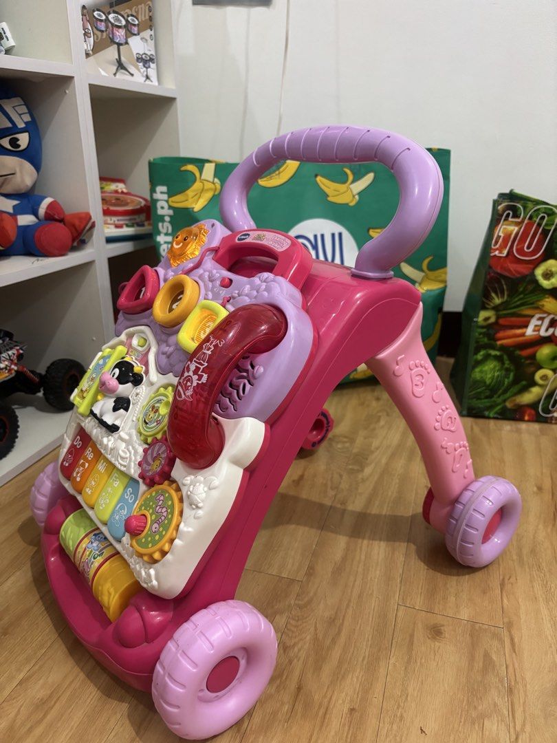 Vtech learning walker (Category: Infant Playtime) located in Valenzuela. Submitted by cmdgbaby (Listing ID 1451894593, Image 3). Description: VTech Learning Walker 🌈🧸 ✔️ Original VTech ✔️ Good condition ✔️ Lights, sounds & interactive learning activities ✔️ Helps encourage baby’s first steps ✔️ Clean and ready to use.