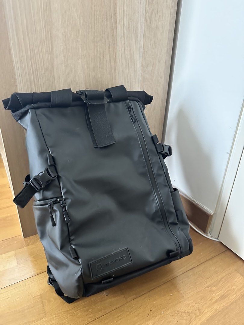 WANDRD PRVKE 41L Backpack Black (Category: Backpacks) located in Putrajaya. Submitted by topekuno (Listing ID 1451731157, Image 1). Description: - Negotiable - WANDRD PRVKE 41L Backpack in Black - Adjustable capacity with roll-top design - Multiple internal compartments for excellent organization - Padded shoulder straps for maximum comfort - Convenient side pockets for water bottles or quick access - Made with durable, high-quality material - Pe