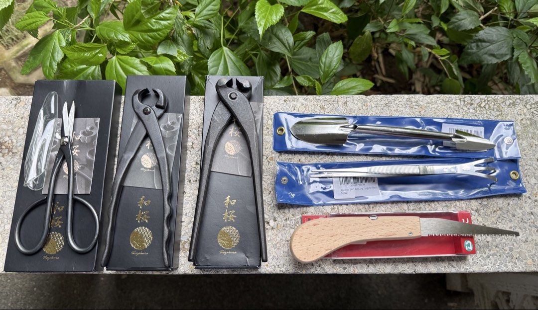 Wazakura Japan Made Bonsai Tools (Category: Gardening Tools & Ornaments) located in Calamba. Submitted by transitory (Listing ID 1451838916, Image 2). Description: Wazakura Bonsai tools Made In Japan Brand New in original packaging Yasugi Steel Satsuki Bonsai Scissors 7”(180mm) ₱2,400 Hand Forged Bonsai Tree Trunk Splitter 8.25”(210mm) ₱3,200 Hand Forged Kuikiri End-Cutting Nipper Pliers 8.25”(210mm) ₱3,300 Curved Tip Tweezer with Rake 8.6”(220mm