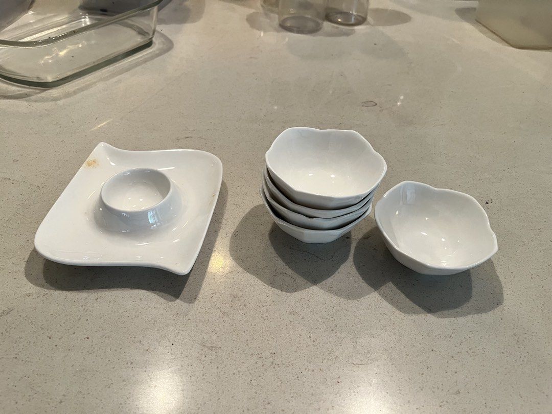 White Ceramic Egg Cup and Sauce Bowls Set (Category: Dinnerware & Cutlery) located in Manila. Submitted by jst_507 (Listing ID 1451846333, Image 1). Description: Price is negotiable -₱80 per sauce bowl - ₱100 for the egg plate -₱ 450 for all Chat us for any concerns or inquiries.