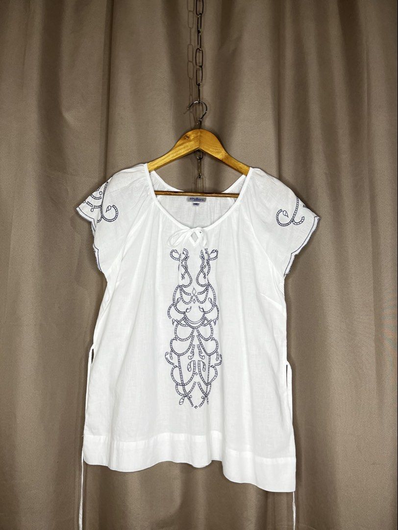 White Embroidered Blouse for Women (Category: Blouses) located in Manila. Submitted by smilingph (Listing ID 1451887645, Image 1). Description: Width: 21 inches Length: 25 inches Large size. Self Ribbon tie at the back. Branded from US see photo para sa brand PM for more details. Color may vary due to photographic lightning .