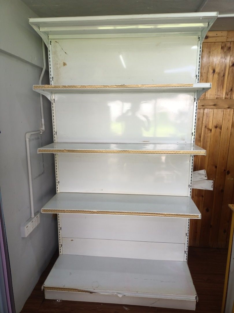 White Metal Retail Display Shelving Unit (Category: Shelves, Cabinets & Racks) located in Kuala Lumpur. Submitted by madkayrie85 (Listing ID 1451820241, Image 1). Description: - Sturdy white metal shelving unit - 5 shelves total (including base shelf) - Light wood-effect trim on shelves - Perfect for retail displays or home storage - Ready for a new home!.