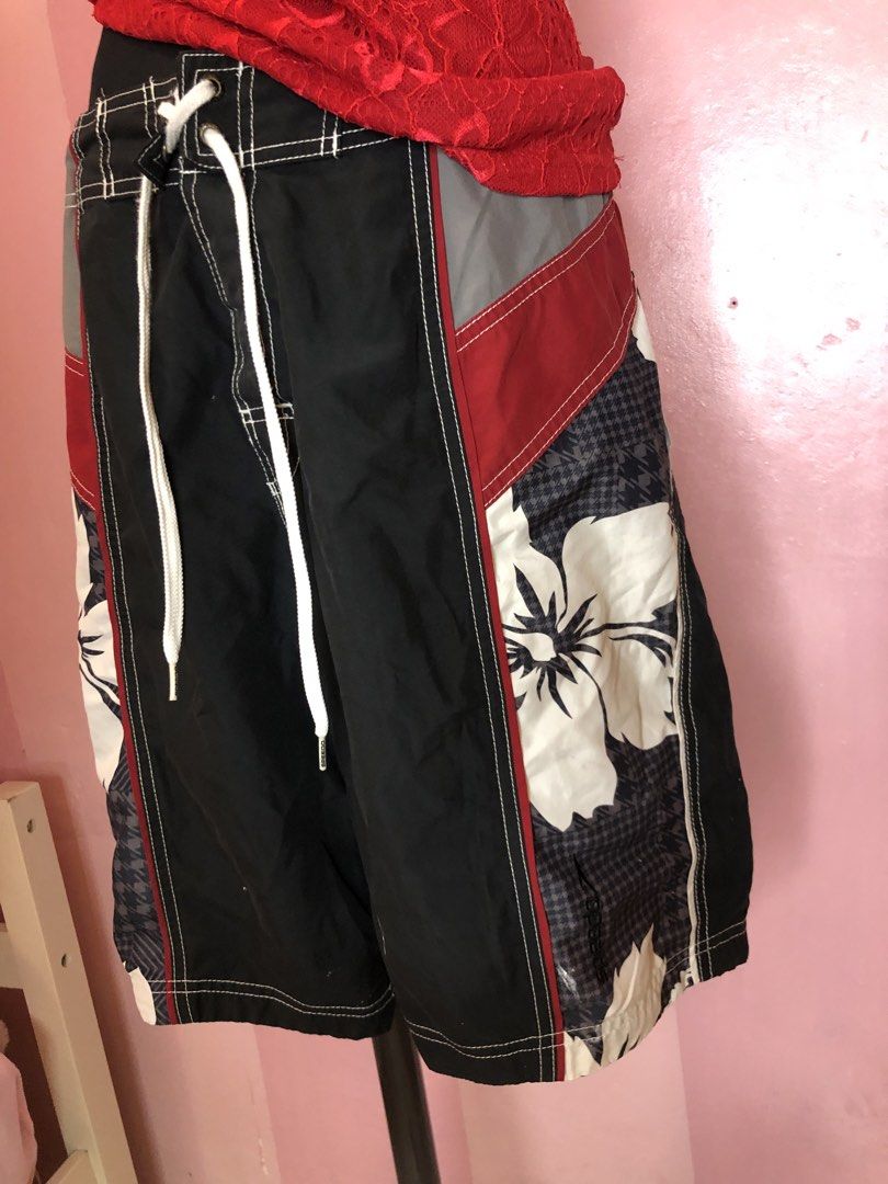 Y2k Bundle! Speedo Board Shorts with Red Sequined Top Y2k (Category: Shorts) located in Manila. Submitted by pinay2000sfinds (Listing ID 1451820190, Image 2). Description: - Brand: Speedo - Color: Black with red and grey panels - Design: Cool floral print on the sides - Features: Drawstring waist - Ideal for: Swimming, lounging, beach trips.