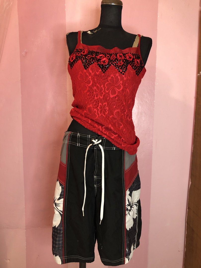Y2k Bundle! Speedo Board Shorts with Red Sequined Top Y2k (Category: Shorts) located in Manila. Submitted by pinay2000sfinds (Listing ID 1451820190, Image 1). Description: - Brand: Speedo - Color: Black with red and grey panels - Design: Cool floral print on the sides - Features: Drawstring waist - Ideal for: Swimming, lounging, beach trips.