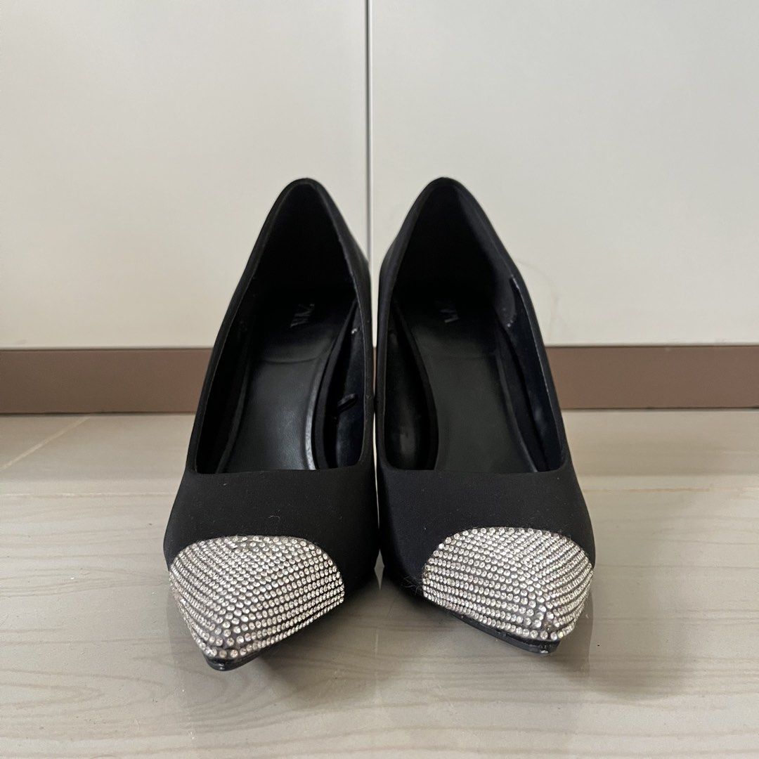 Zara Black Heels with Rhinestone Toe Cap (Category: Heels) located in Manila. Submitted by heraaa21 (Listing ID 1451750173, Image 3). Description: Chic black pointed-toe heels with a sparkly rhinestone cap and glossy stiletto heel. Perfect for dressing up and comfortable for a night out..