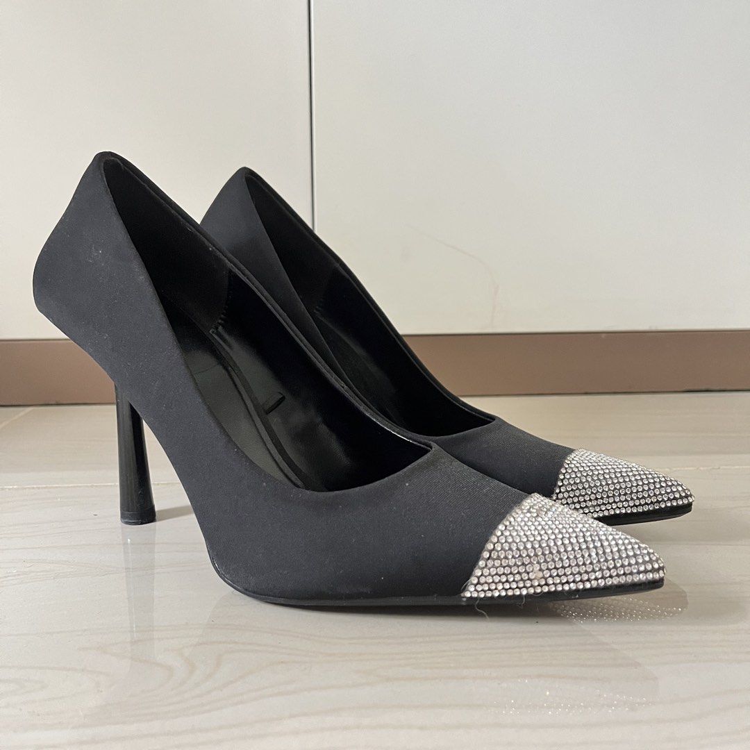 Zara Black Heels with Rhinestone Toe Cap (Category: Heels) located in Manila. Submitted by heraaa21 (Listing ID 1451750173, Image 1). Description: Chic black pointed-toe heels with a sparkly rhinestone cap and glossy stiletto heel. Perfect for dressing up and comfortable for a night out..