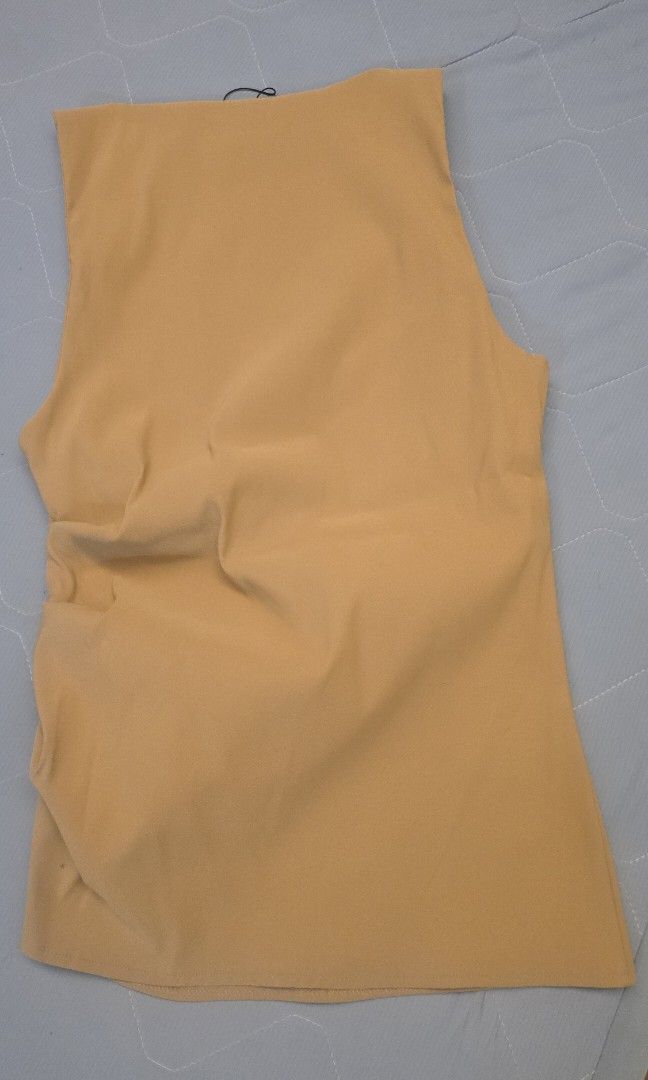 Zara Camel Sleeveless Top (Category: Sleeveless) located in Taguig. Submitted by c_rivera (Listing ID 1451851707, Image 3). Description: like new. fits medium to semi large. stretchy. nice fit. rfs decluttering.
