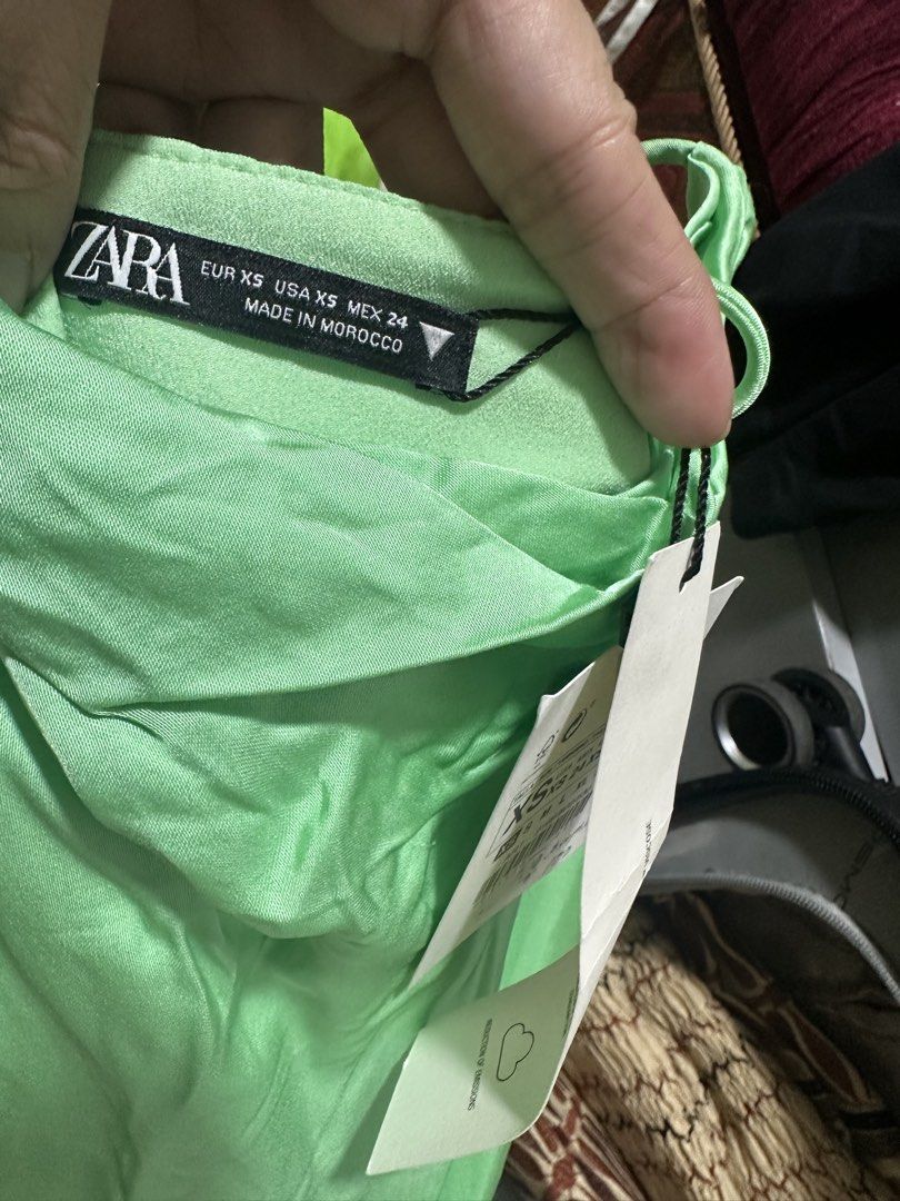 Zara Green Cowl Neck Spaghetti Strap Crop Top (Category: Sleeveless) located in Cainta. Submitted by qualityyetaffordable (Listing ID 1451793120, Image 3). Description: - Zara green cowl neck crop top - Spaghetti straps - Silky material - Size XS - Brand new with tags, never worn - Perfect with jeans or a skirt.