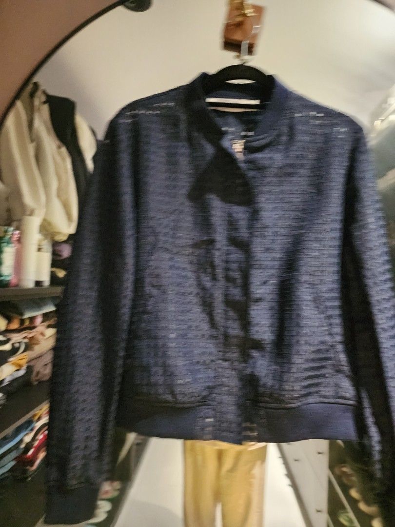 ZARA Navy Blue Textured Bomber Jacket (Category: Coats, Jackets and Outerwear) located in Muntinlupa City. Submitted by sofia010317 (Listing ID 1451804486, Image 3). Description: ZARA - Navy blue bomber jacket - Unique textured pattern - Zip-up front closure - Ribbed cuffs and hem - Ideal for casual layering over t-shirts or shirts .