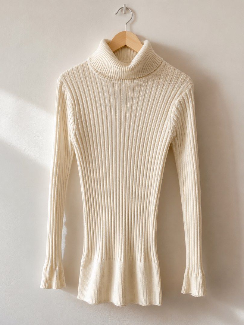 2 stretchable Cream Ribbed Knit and Turtleneck Sweater (Category: Longsleeves) located in Valencia. Submitted by bruuuuh (Listing ID 1451942715, Image 1). Description: - 2 winter clothes for 700 - turtle neck is off brand - long sleeves is H&M -Cream ribbed knit sweater - Long sleeves with flared cuffs - Turtleneck design - Stretchy, soft, and comfortable material - Ideal for layering or wearing solo - Best fits size Small to Medium.