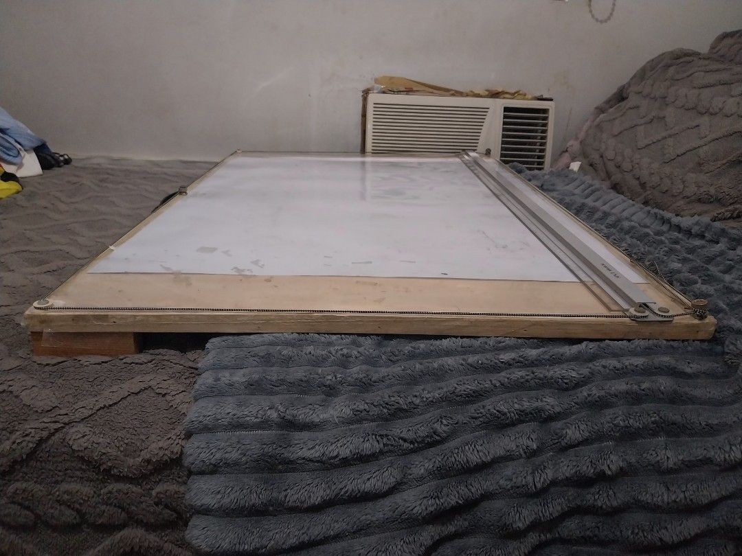60cm x 90cm Drafting Board with Bolted Straight Ruler (Category: Craft Supplies & Tools) located in Manila. Submitted by juiceboxtrove (Listing ID 1451987740, Image 2). Description: -Used during the boards and 1st-2nd Year of College -Sealed with plastic and taped on edges -Minor plastic rip on the back MOP: gcash bank transfer (unionbank) maya ***shipping is by the buyer.