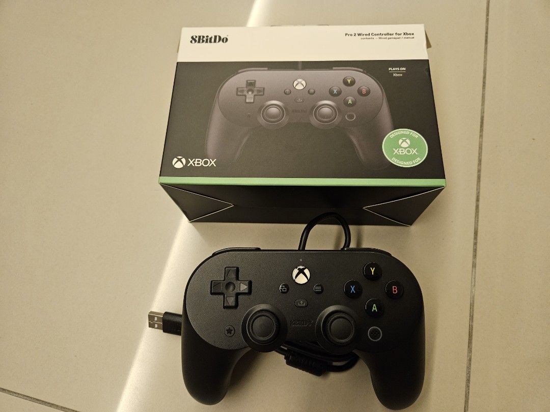 8BitDo Pro 2 Wired Controller for Xbox (Category: Controllers) located in Kuala Lumpur. Submitted by deschoong (Listing ID 1452080699, Image 1). Description: - 8BitDo Pro 2 Wired Controller - Designed for Xbox consoles - Includes original box and manual - Perfect for an enhanced gaming experience.