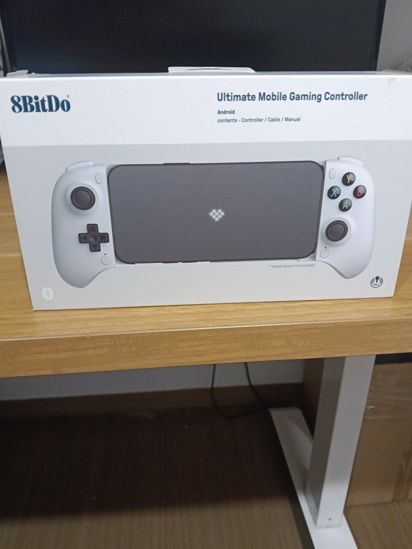 8BitDo Ultimate Mobile Gaming Controller for Android (Category: Controllers) located in Singapore. Submitted by evangelion1512 (Listing ID 1451979430, Image 1). Description: - 8BitDo Ultimate Mobile Gaming Controller - Designed for Android phones - Ideal for gaming on the go - Package includes: Controller, Cable, Manual - Mobile phone not included.