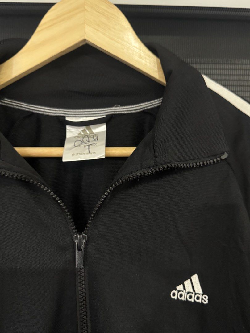 Adidas Essentials Track Jacket Black White Stripes (Category: Coats, Jackets and Outerwear) located in Manila. Submitted by misfits.ph (Listing ID 1452036762, Image 2). Description: Adidas Essentials Track Jacket Large 22 x 26 Complete tags QR Excellent condi 9+ color rate Tight ribbings See pics to appreciate ₱880 only Manila area Jnt lalamove.