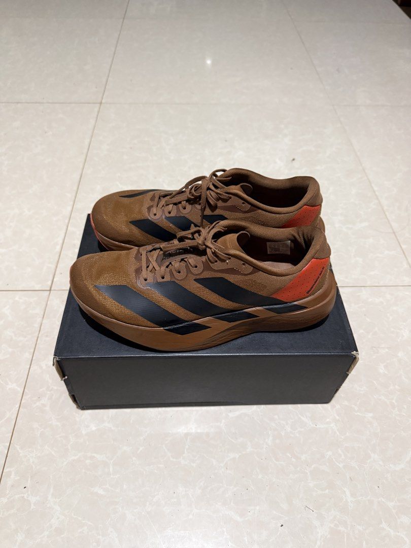 Adidas x humanrace Evo SL Brown (Category: Sneakers) located in Quezon City. Submitted by senam56 (Listing ID 1452071800, Image 1). Description: Adidas x humanrace Pharell Williams Evo SL Size: 8.5 US / 8 UK / 42 FR / 265 JP / 260 CHN Condition: Used Running mileage at around 50km With Box and orange laces 5,000 pesos Baguio Based Add 250 for shipping.