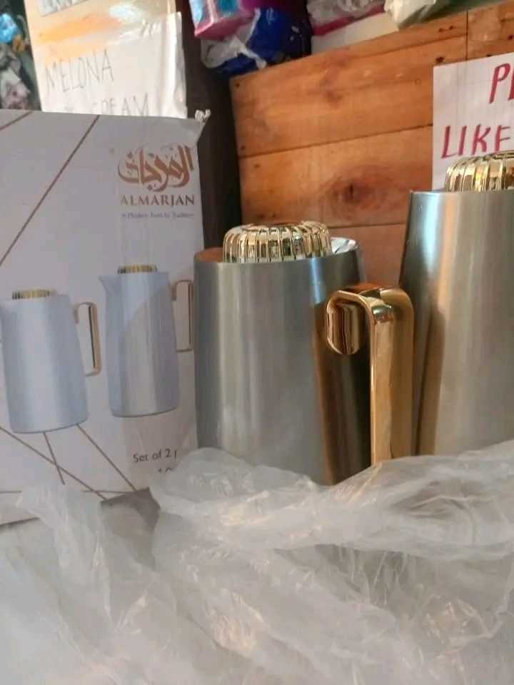 ALMARJAN Arabic Tea & Coffee Thermos Set (Category: Kettles & Airpots) located in Manila. Submitted by rubymielbona (Listing ID 1451900470, Image 1). Description: ✨ ALMARJAN Arabic Tea & Coffee Thermos Set ✨ ☕ Set of 2 ✅ Brand New ✅ Elegant Gold Handle & Lid ✅ Keeps drinks hot or cold longer 💰 Only ₱699 ‼️‼️ Market price: 1,500❌❌ 📍 Nangka, Marikina.