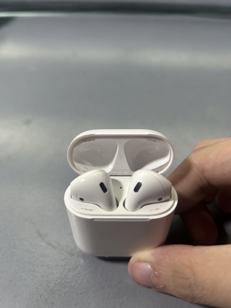 Apple AirPods (2nd Generation) with Charging Case (Category: Earphones) located in Manila. Submitted by roeljeoffr49221 (Listing ID 1451908262, Image 1). Description: - Negotiable price - Apple AirPods 2nd Generation - Includes charging case - Minor signs of wear on earbuds and case interior - Left airpod’s battery drains faster - Selling because of an upgrade .