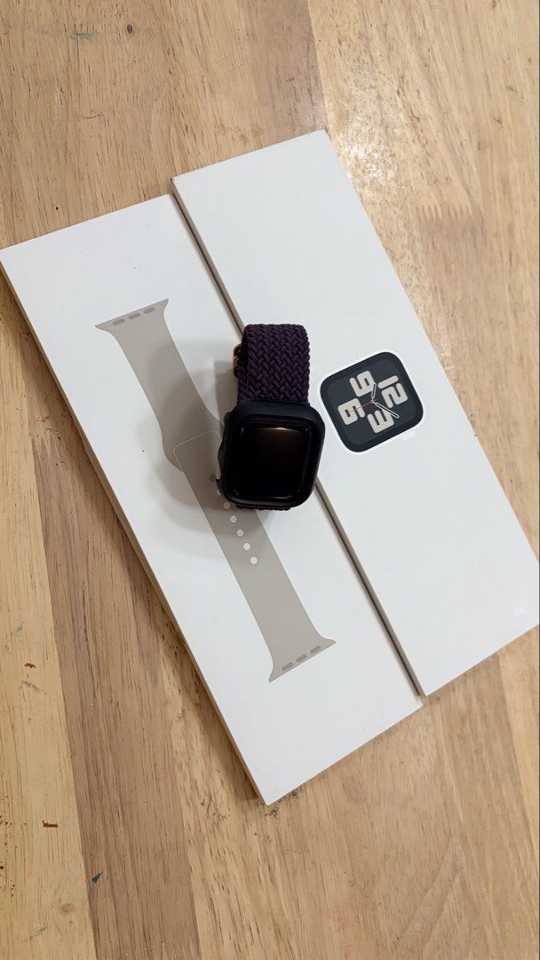 Apple Watch SE (Gen 2) 40mm (Category: Wearables & Smart Watches) located in Shah Alam. Submitted by awankunano (Listing ID 1451964474, Image 1). Description: - Apple Watch SE (Gen 2) - Size: 40mm - Starlight GPS - Battery Health 90% - Condition: Good (as pictured) - Includes: Original box, including cable charger, braided solo loop band (purple/burgundy), protective bumper case - Features: Stay connected, track fitness, stylish design.