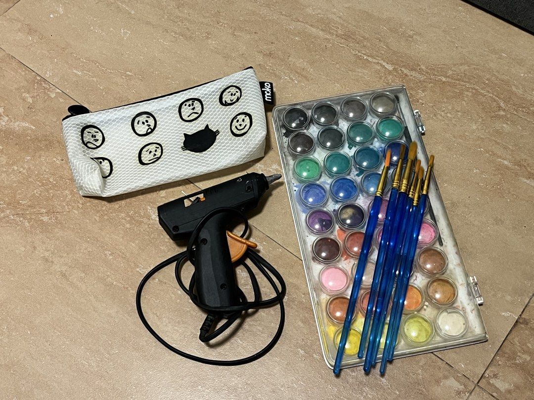 Art Supplies, Stationery, Accessories Bundle (Category: Craft Supplies & Tools) located in Manila. Submitted by glam_it_up_store (Listing ID 1452062541, Image 3). Description: - Watercolor paint set with brushes - Cute pencil case - Hot glue gun - Notebooks and planner - Keychains and bracelets - Ideal for art, crafts, and personal use.