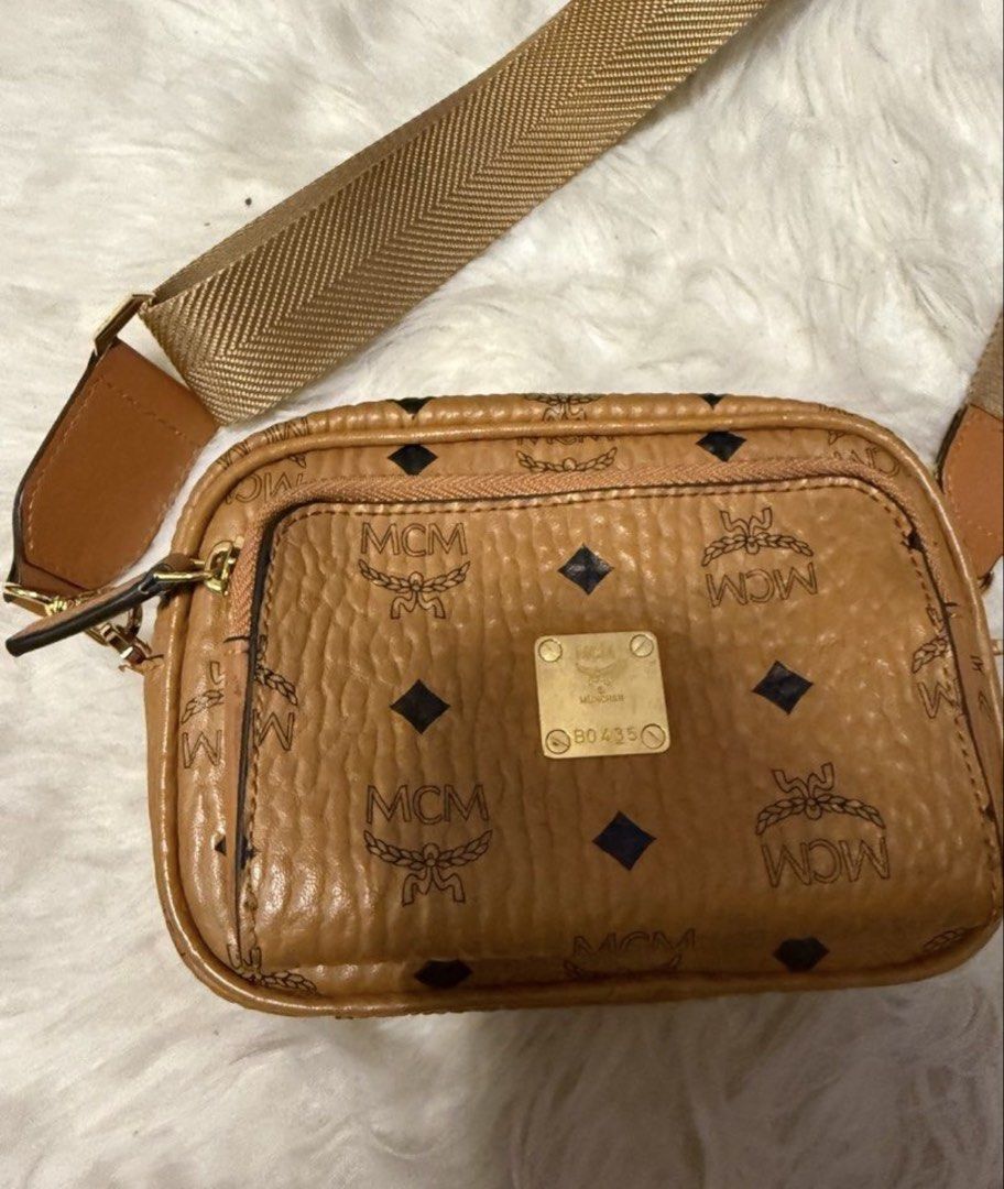 Authentic MCM Two-Way Bag (Category: Luxury Bags & Wallets) located in Santa Rosa. Submitted by jessaruth (Listing ID 1451904618, Image 1). Description: Authentic/Original Store-bought (with white tag) Turnable screws Wasn’t able to store properly hence some issues (kayo na po bahalang magpaayos) Clean body/inside Clean strap Very gold hardware .