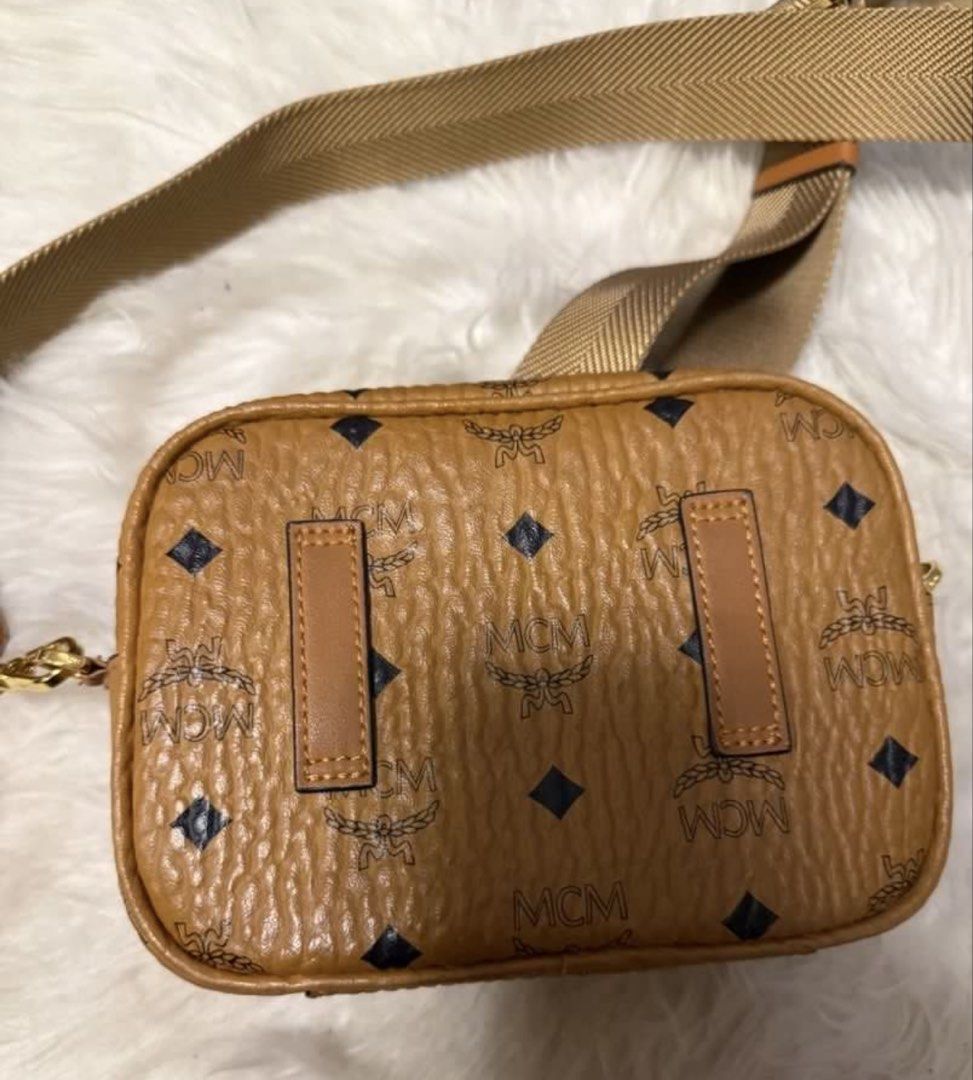 Authentic MCM Two-Way Bag (Category: Luxury Bags & Wallets) located in Santa Rosa. Submitted by jessaruth (Listing ID 1451904618, Image 2). Description: Authentic/Original Store-bought (with white tag) Turnable screws Wasn’t able to store properly hence some issues (kayo na po bahalang magpaayos) Clean body/inside Clean strap Very gold hardware .