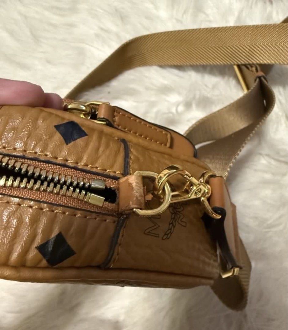 Authentic MCM Two-Way Bag (Category: Luxury Bags & Wallets) located in Santa Rosa. Submitted by jessaruth (Listing ID 1451904618, Image 3). Description: Authentic/Original Store-bought (with white tag) Turnable screws Wasn’t able to store properly hence some issues (kayo na po bahalang magpaayos) Clean body/inside Clean strap Very gold hardware .