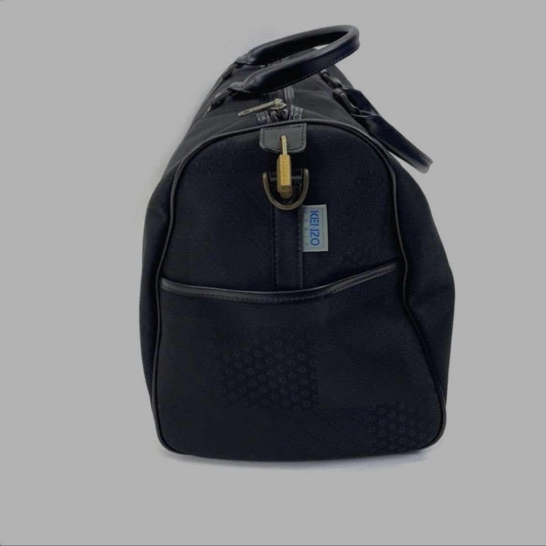 Authentic Vintage Kenzo Boston Duffle Bag (Category: Luxury Bags & Wallets) located in Angono. Submitted by just.call.me_lazy (Listing ID 1452092721, Image 3). Description: Authentic Vintage Kenzo Boston Duffle Bag 🖤✨ Travel in style with this Kenzo Boston duffle — a rare vintage piece that blends functionality with luxury. Perfect for collectors or as a chic travel companion. 📌 Features: ✔️Structured duffle silhouette in textured fabric + leat