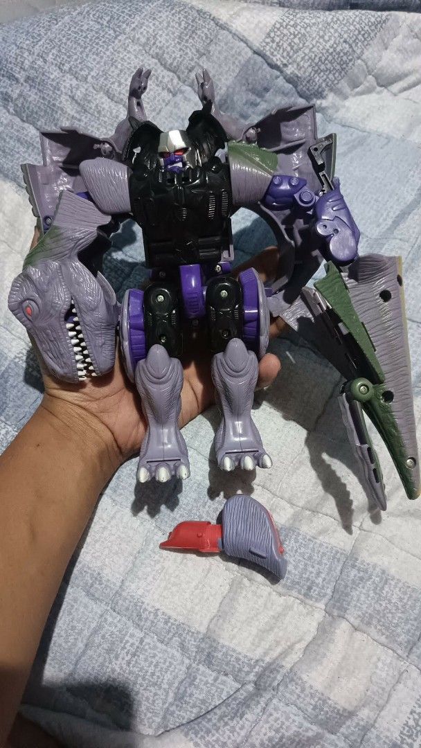 Beast Wars Megatron Transformer Toy (Category: Action & Battle Toys) located in Caloocan City. Submitted by aquasaurus (Listing ID 1451940458, Image 2). Description: - Beast Wars Megatron Transformer Toy - Transforms between Robot and Dinosaur modes - Perfect for collectors - Great display piece.