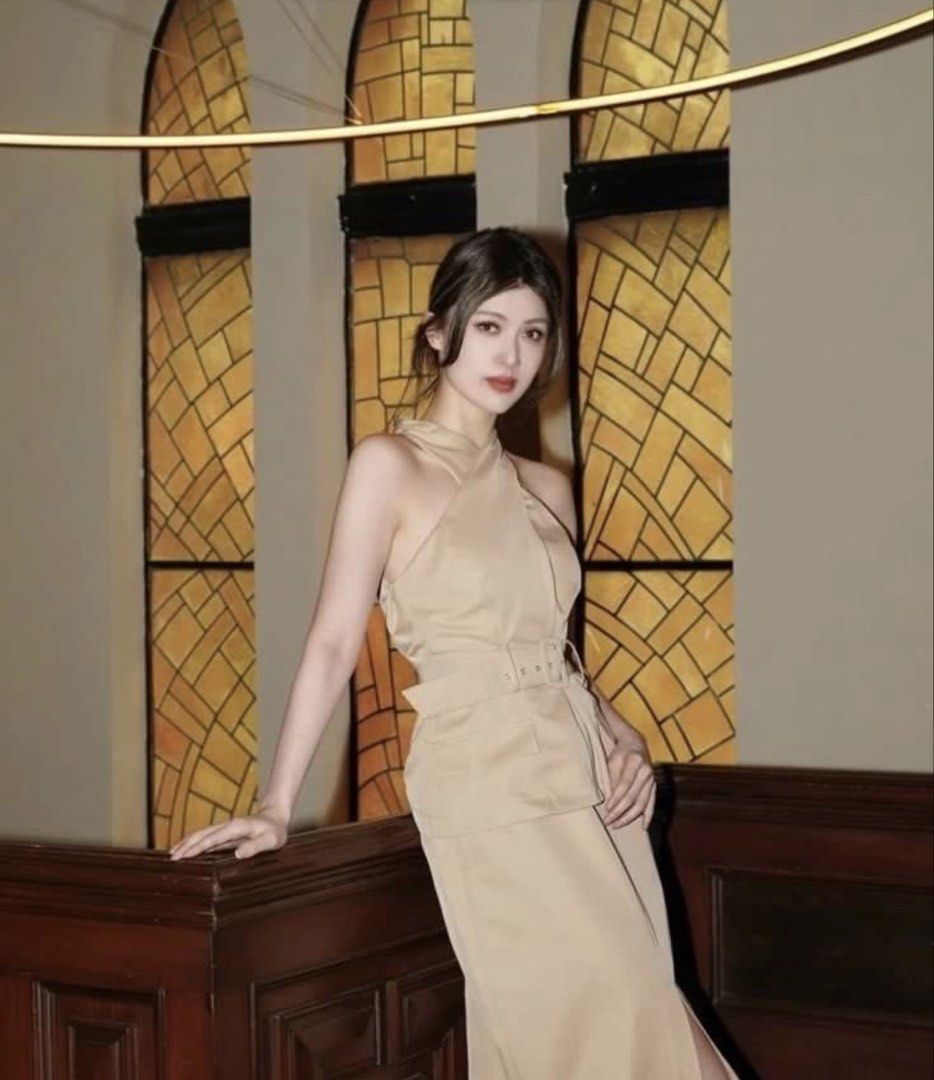 Beige Halter Neck Top and Skirt Set (Category: Sets or Coordinates) located in Cebu City. Submitted by i_van22 (Listing ID 1452070403, Image 2). Description: - Chic beige halter neck top - Unique crossover design with belted waist - Flattering midi skirt silhouette - Comfortable fabric - Ideal for events or a sophisticated look - Looks good on.
