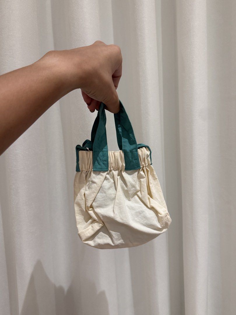 Beyond the Vines Micro Dumpling Bag in a Limited Edition Color (Category: Cross-body Bags) located in Angeles City. Submitted by declutterstudio (Listing ID 1452068802, Image 2). Description: .