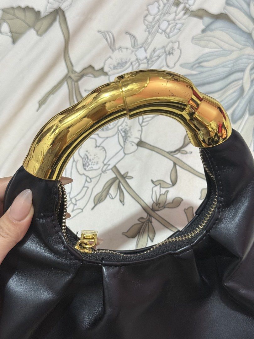 Black hand bag (Category: Shoulder Bags) located in Taguig. Submitted by chen.preloveddd (Listing ID 1451960650, Image 2). Description: - Used once in event - With scratches sa handle Rfs: Need some space for my bag closet 📍 Taguig south signal village.