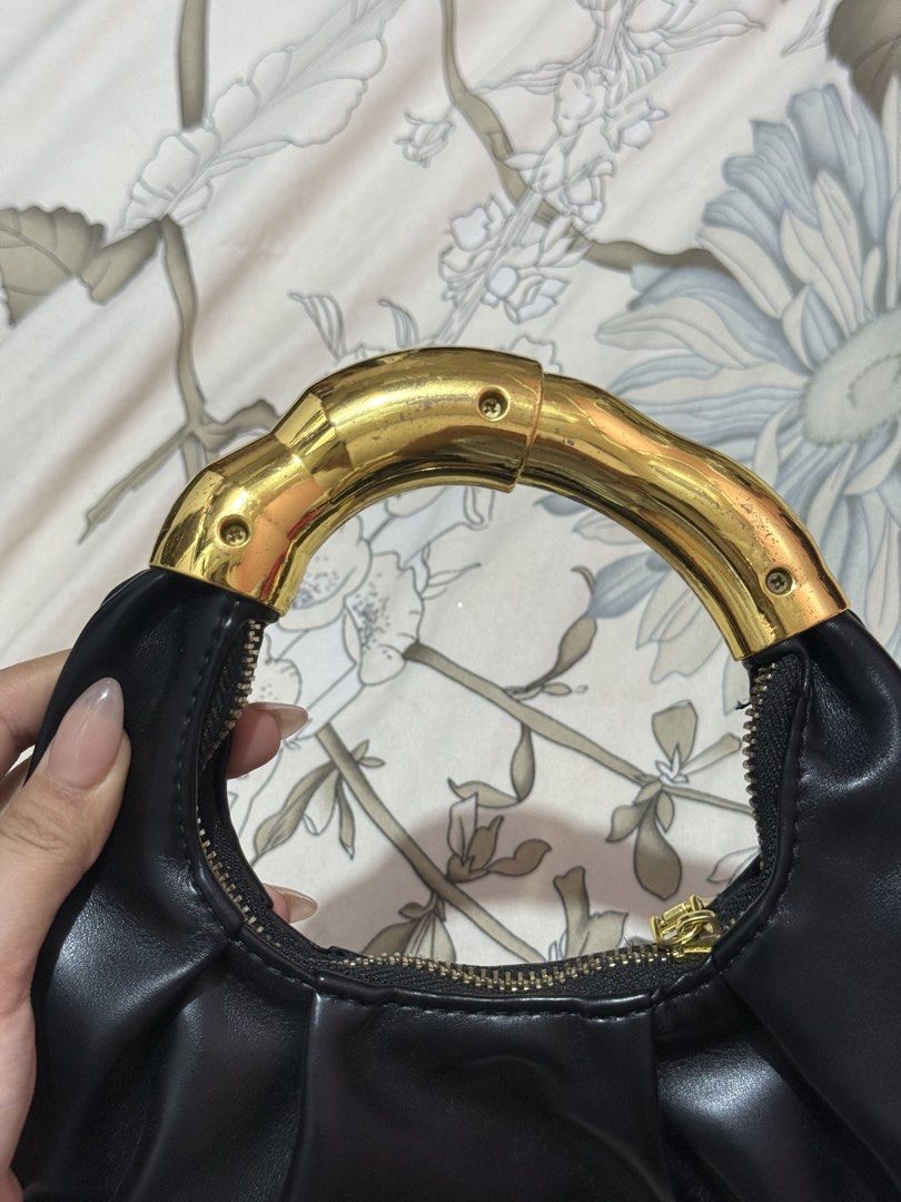 Black hand bag (Category: Shoulder Bags) located in Taguig. Submitted by chen.preloveddd (Listing ID 1451960650, Image 3). Description: - Used once in event - With scratches sa handle Rfs: Need some space for my bag closet 📍 Taguig south signal village.