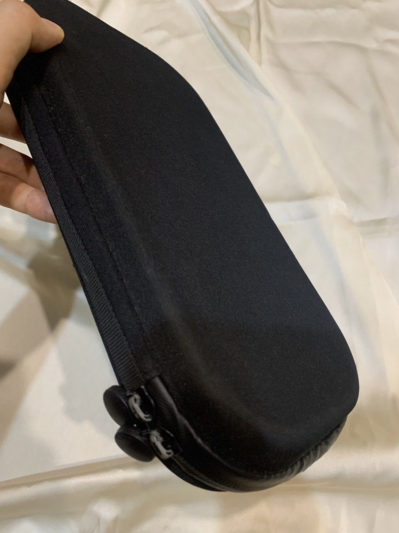 Black Hard Shell Storage Case with Mesh Pocket (Category: Storage Boxes & Baskets) located in Manila. Submitted by gracefilledshop (Listing ID 1452028333, Image 3). Description: - Black storage case with zippered closure. - Interior features a mesh pocket on one side. - Other side has molded compartments for organized storage. - Ideal for travel or keeping items tidy. .