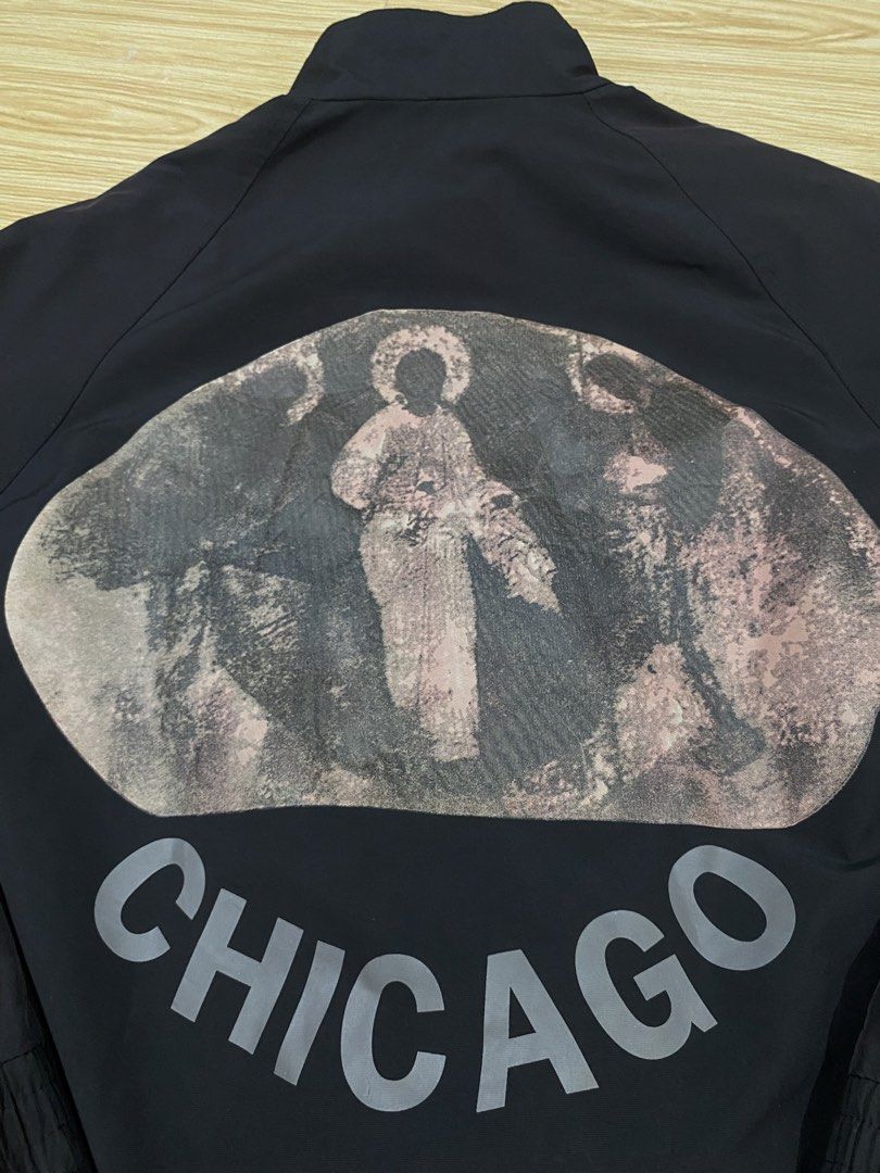 Black Jesus King Chicago Graphic Bomber Jacket (Category: Coats, Jackets and Outerwear) located in Manila. Submitted by dropndrip (Listing ID 1452072412, Image 3). Description: - Black bomber jacket - 'JESUS KING' text on the front - Graphic print with 'CHICAGO' on the back - 22x25 .