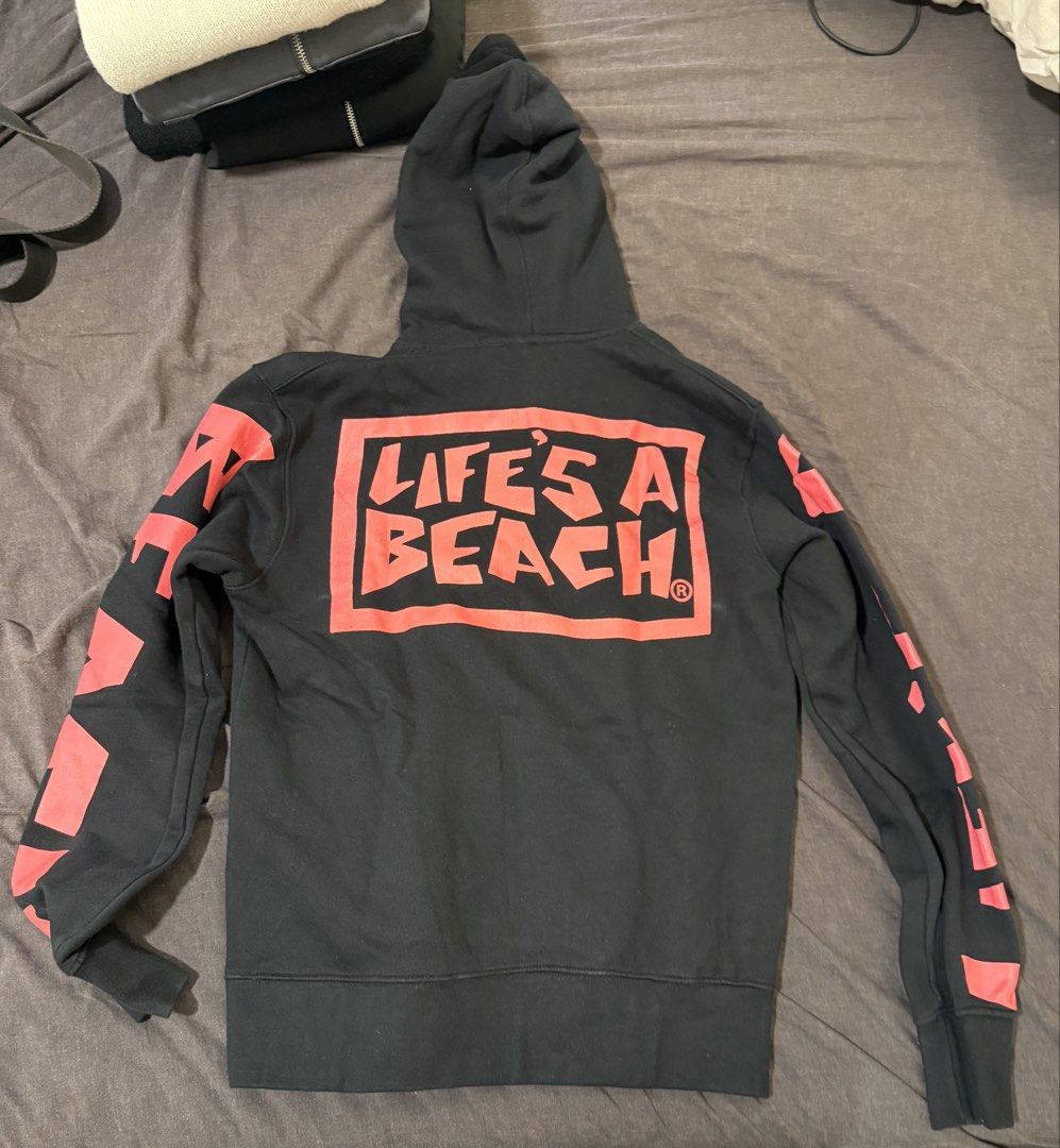 Black Life's A Beach Hoodie (Category: Hoodies) located in Manila. Submitted by jpumpa (Listing ID 1452048105, Image 2). Description: - Black hoodie - 'Life's A Beach' graphic on front, back, and sleeves - Front pocket - Drawstring hood - Ideal for casual wear Medium but fits Smal.
