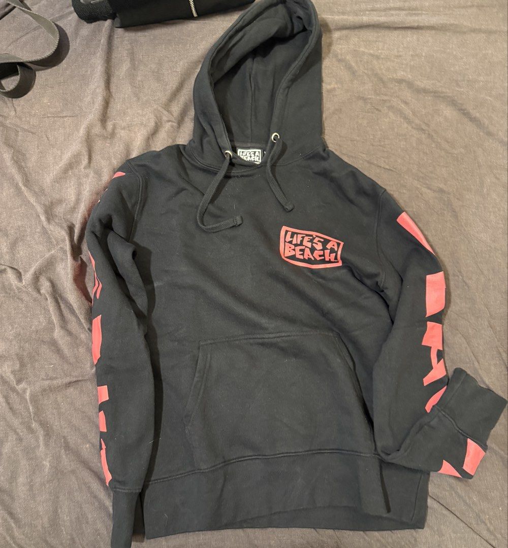 Black Life's A Beach Hoodie (Category: Hoodies) located in Manila. Submitted by jpumpa (Listing ID 1452048105, Image 1). Description: - Black hoodie - 'Life's A Beach' graphic on front, back, and sleeves - Front pocket - Drawstring hood - Ideal for casual wear Medium but fits Smal.