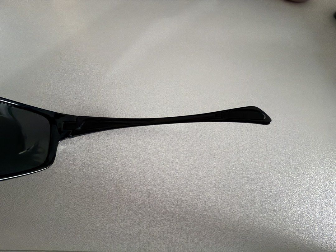 Black Rectangular Sunglasses (Category: Sunglasses & Eyewear) located in Singapore. Submitted by bookwormreally (Listing ID 1452009780, Image 3). Description: - Classic black sunglasses - Dark lenses for sun protection - Rectangular frame shape - Thin arms - Suitable for everyday wear.