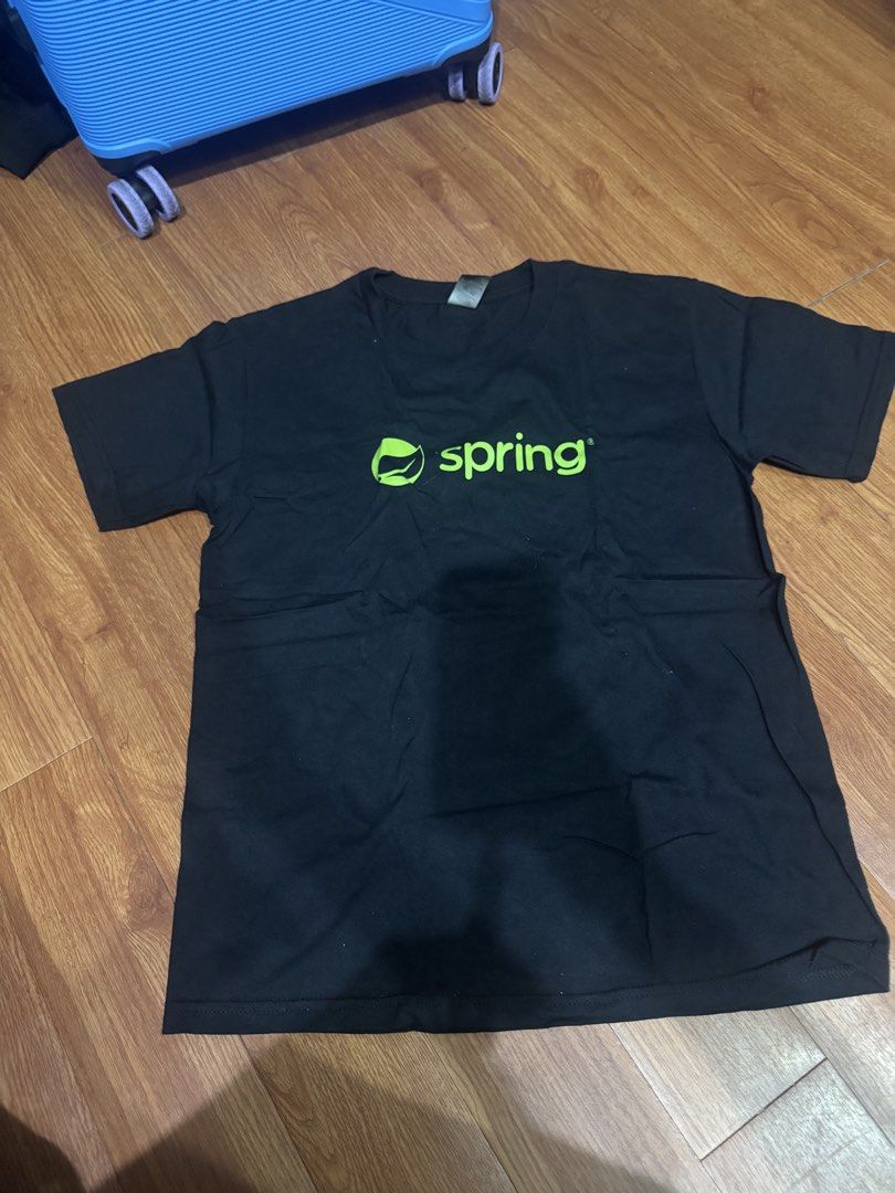 Black VMware Tanzu Java Spring T-shirt (Category: Tshirts & Polo Shirts ) located in Las Pinas. Submitted by katfg (Listing ID 1451961258, Image 1). Description: - Black t-shirt - Features 'Spring' logo on the front - 'VMware Tanzu' text on the back - Made from comfortable cotton material - Ideal for tech events or casual wear - Logos are clearly visible.