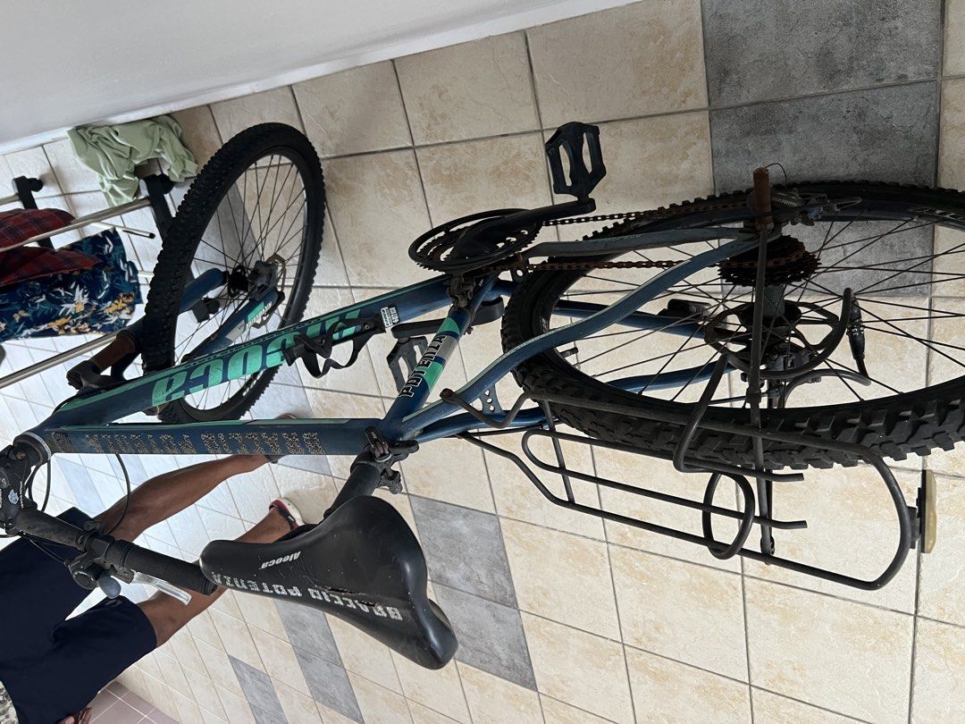 By cycle (Category: Bicycles) located in Singapore. Submitted by lenin_sg (Listing ID 1452031421, Image 1). Description: It is not in use, as it has been lying unused for a long time Size - 26 Negotiable .