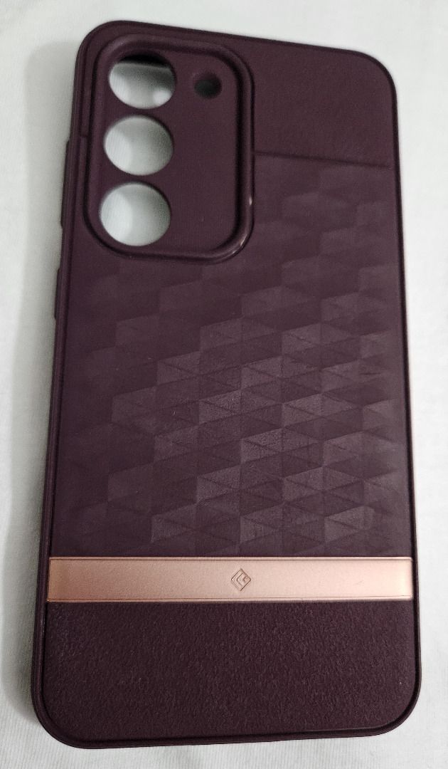 Caseology Case for Samsung Galaxy S23 (Category: Cases & Sleeves) located in Makati City. Submitted by KuWeLaDevil01 (Listing ID 1451965762, Image 1). Description: Caseology Parallax Series A phone case for your Samsung Galaxy S23. It is burgundy colored with textured geometric patterns and a rose gold accent. It is still also a bit tough, as some people here say, "makunat pa." I don't know if I got that right. We require payment first, accepting