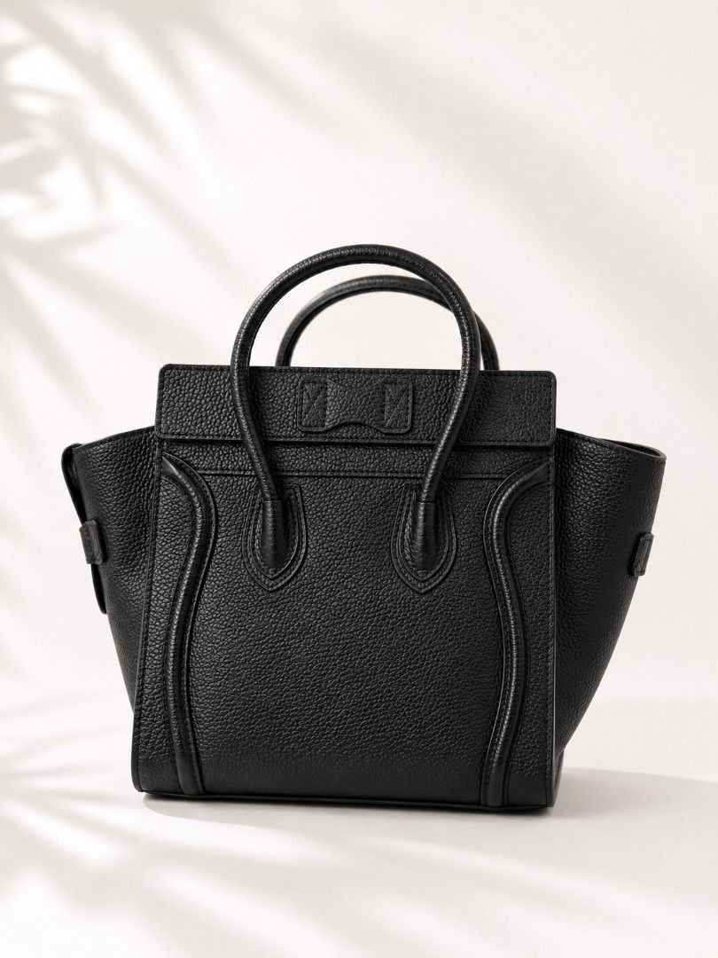 Celine Luggage (Category: Luxury Bags & Wallets) located in Pateros City. Submitted by hoarderhub (Listing ID 1452083119, Image 2). Description: Celine Micro Luggage Leather Handbag – Silver Hardware - Measurements: 30 × 29 × 17 cm. - RFS: Never used. ALL MUST GO – Declutter Sale from my personal collection. - Price is already heavily reduced and firm. No offers or negotiations, please. - All photos are current and taken by me using a DSLR. What 