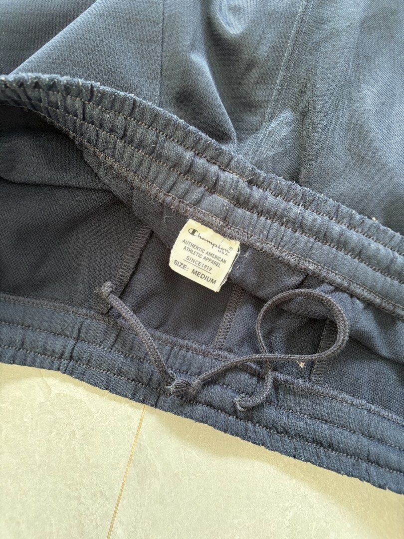 Champion Navy Blue Athletic Shorts Size Medium (Category: Shorts) located in Tanza. Submitted by pompompvrin (Listing ID 1452102714, Image 3). Description: length 21 in waist 38 in.