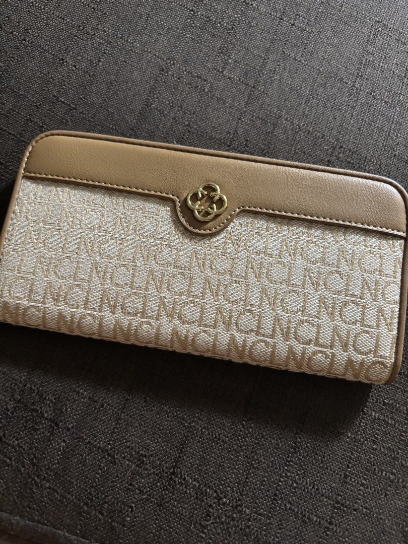 CL by CLN Monogram Wallet (Category: Wallets & Card holders) located in Taguig. Submitted by macxdinglas (Listing ID 1451935694, Image 2). Description: - Brand: CL by CLN - Style: Monogram Wallet - Color: Beige and Tan - Exterior: Zip pocket - Interior: Multiple card slots - Closure: Snap closure - Hardware: Gold details - Condition: Clean inside and out.