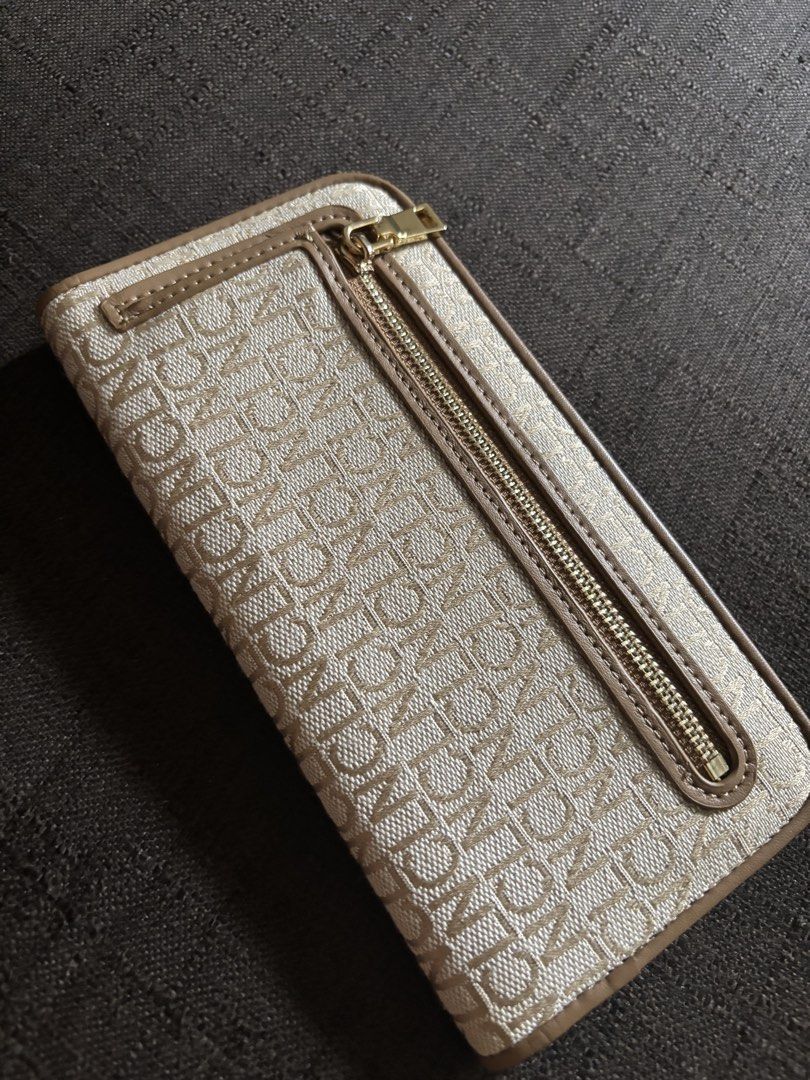 CL by CLN Monogram Wallet (Category: Wallets & Card holders) located in Taguig. Submitted by macxdinglas (Listing ID 1451935694, Image 3). Description: - Brand: CL by CLN - Style: Monogram Wallet - Color: Beige and Tan - Exterior: Zip pocket - Interior: Multiple card slots - Closure: Snap closure - Hardware: Gold details - Condition: Clean inside and out.