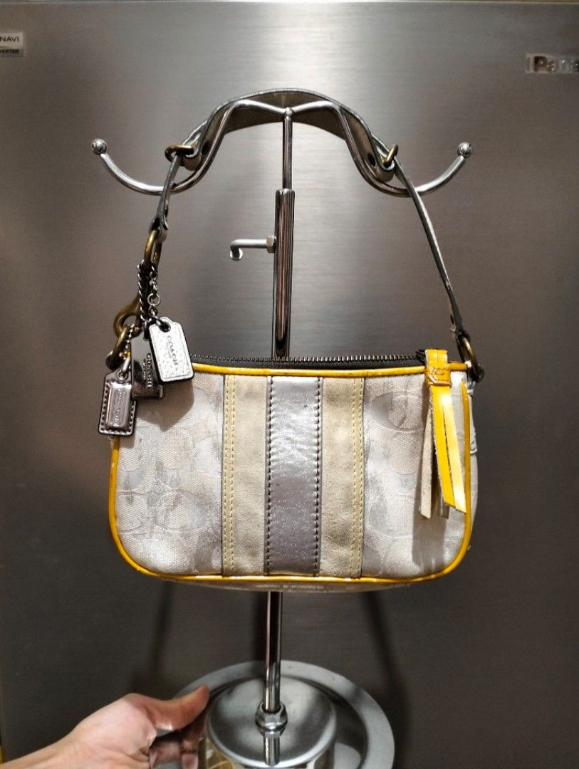 Coach Demi bag in silver (Category: Shoulder Bags) located in Manila. Submitted by alayassulittipidfinds (Listing ID 1452077786, Image 1). Description: .