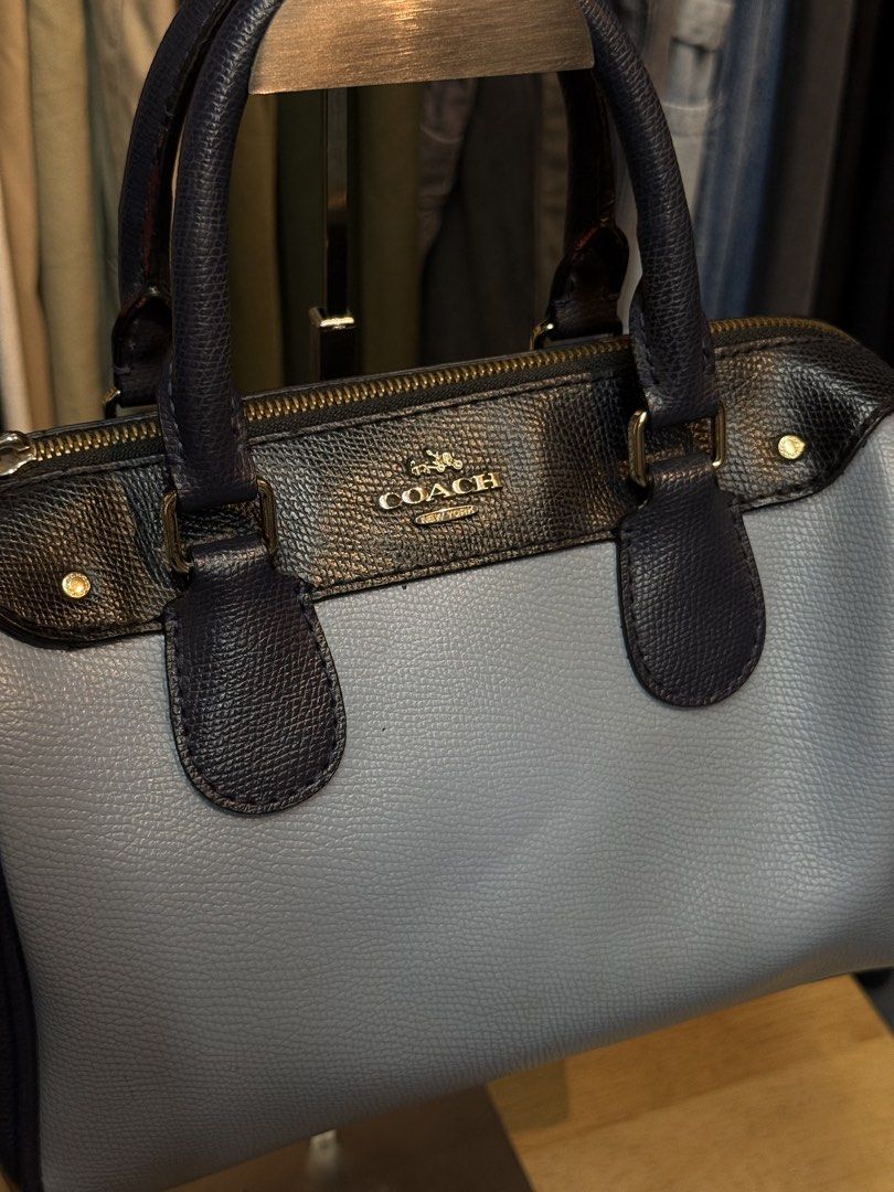 Coach Pebbled Leather Satchel Bag Navy Blue Grey (Category: Luxury Bags & Wallets) located in Legazpi City. Submitted by deadthrift (Listing ID 1452096150, Image 2). Description: - Coach satchel bag - Mix of grey and navy blue pebbled leather - Gold hardware details - Zipper closure - Top handles - Interior Coach creed patch - Great everyday bag.